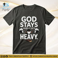 God Stays When It Gets Heavy T‑Shirt – Strength & Support Christian Tee