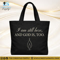“I Am Still Here, and God Is, Too” Inspirational Christian Tote Bag – Durable 12oz Cotton Canvas Reusable Shoulder Bag for Daily Use